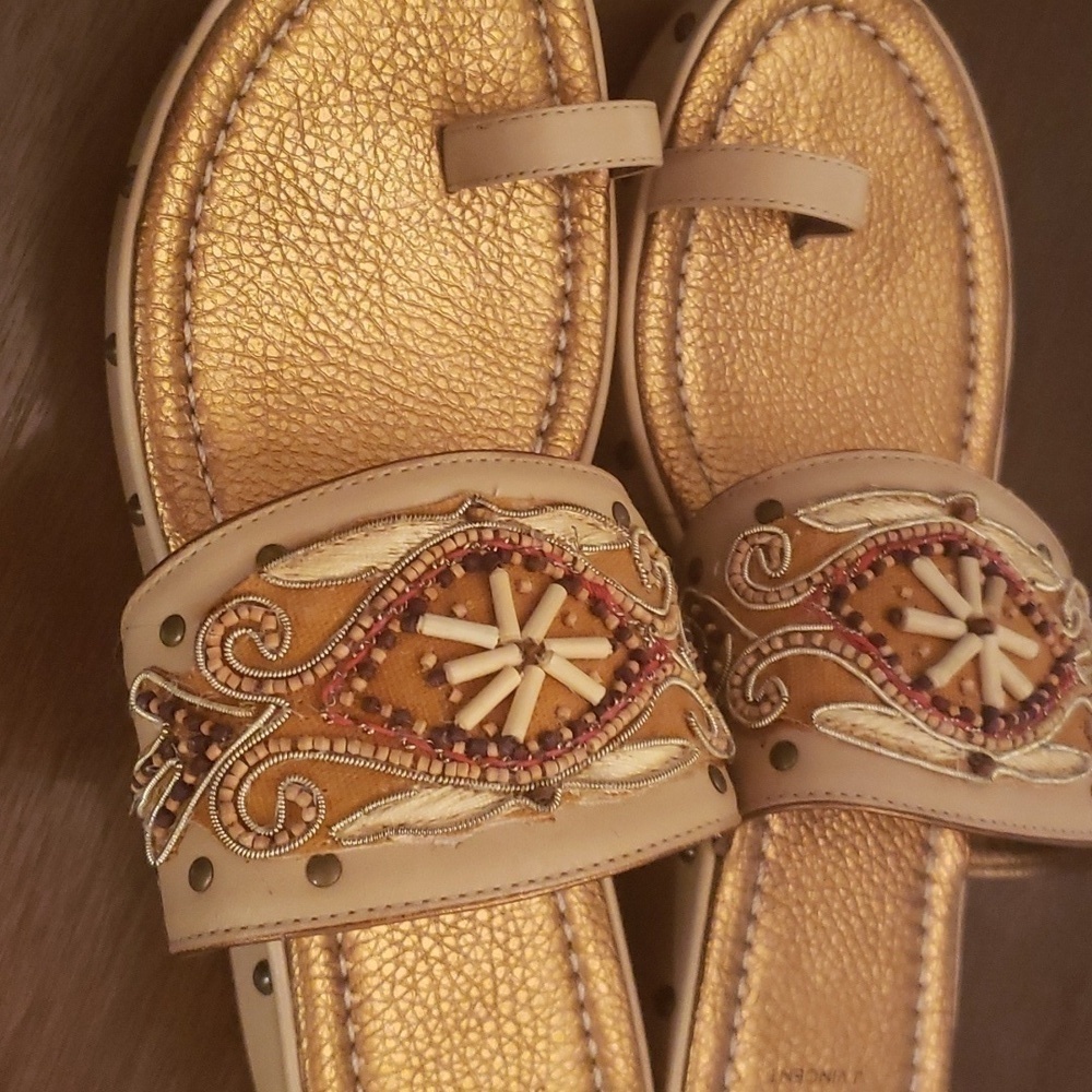 J. Vincent ladies 8m slides with embellished details.